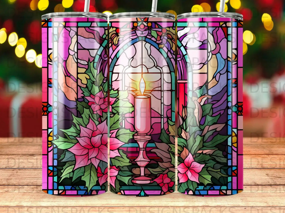 Stained glass window with poinsettias and a candle, on a tumbler.