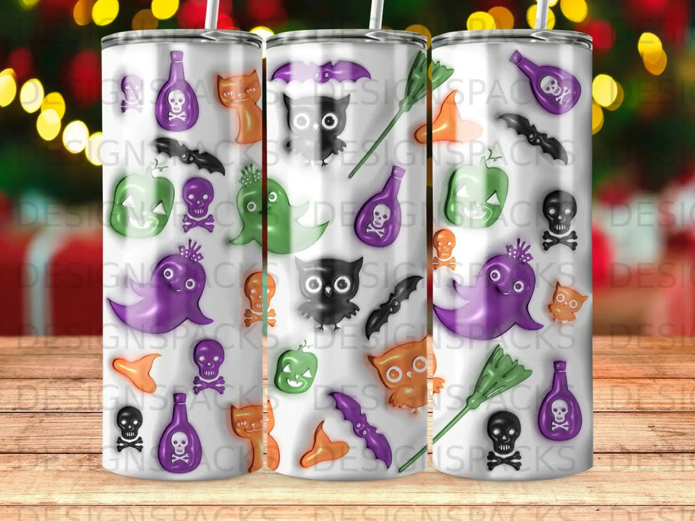 Three tumblers featuring Halloween-themed ghost, owl, and skeleton designs.