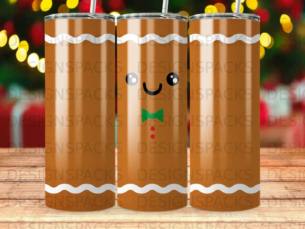 Three gingerbread man tumblers with white icing trim and red candy buttons.