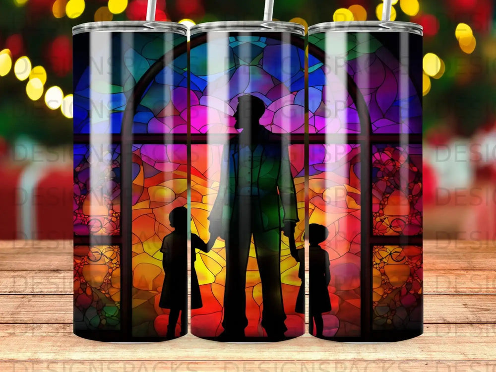 Silhouette of a person holding hands with two children in front of a colorful stained-glass window.