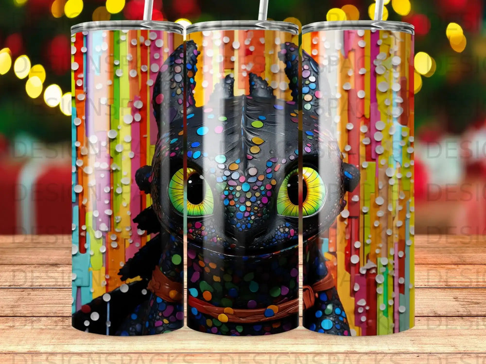 Toothless from How to Train Your Dragon on a colorful, striped tumbler.