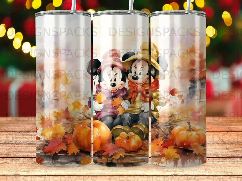 Minnie and Mickey Mouse sit among autumn leaves and pumpkins.