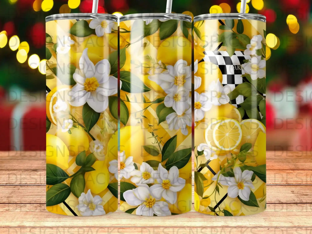 Tumbler with lemons, white flowers, and checkered flag pattern.