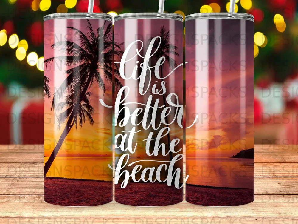Tumbler with palm trees, "life is better at the beach" text, and sunset background.