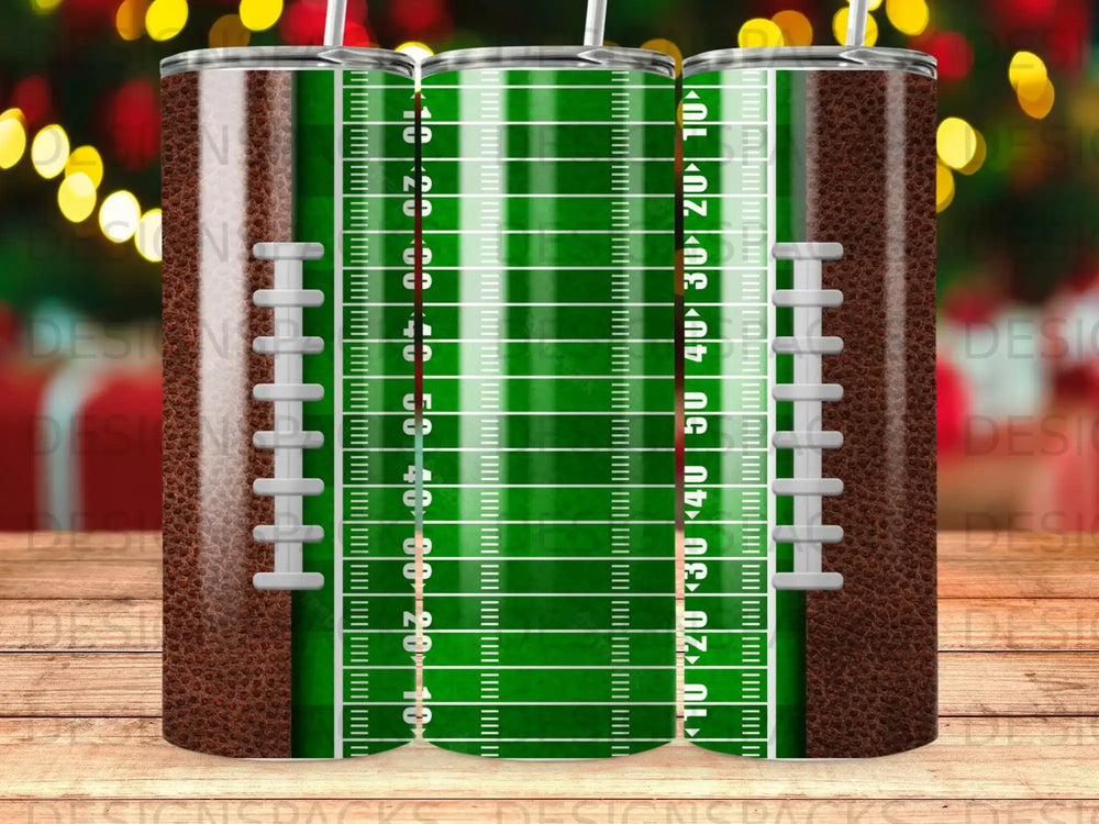 Football field tumbler with yard markers and stitched football texture.