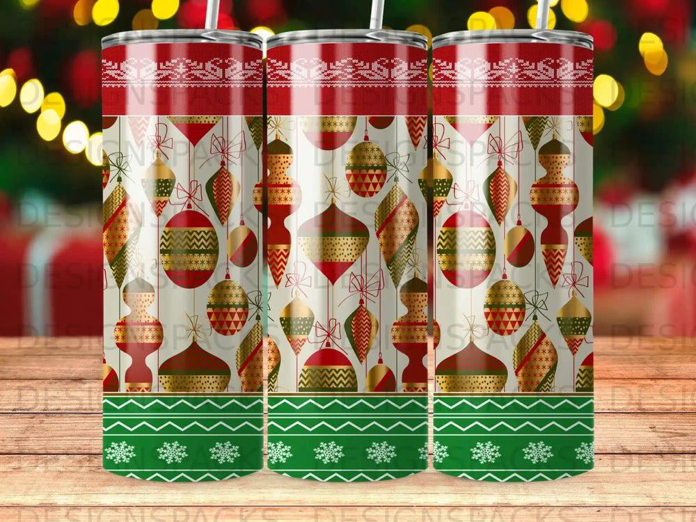 Tumbler with red, green, and gold Christmas ornaments and snowflake border.