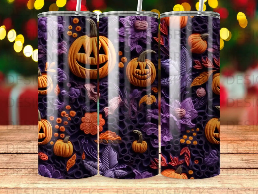 Halloween pumpkins, leaves, and flowers pattern on a tumbler.