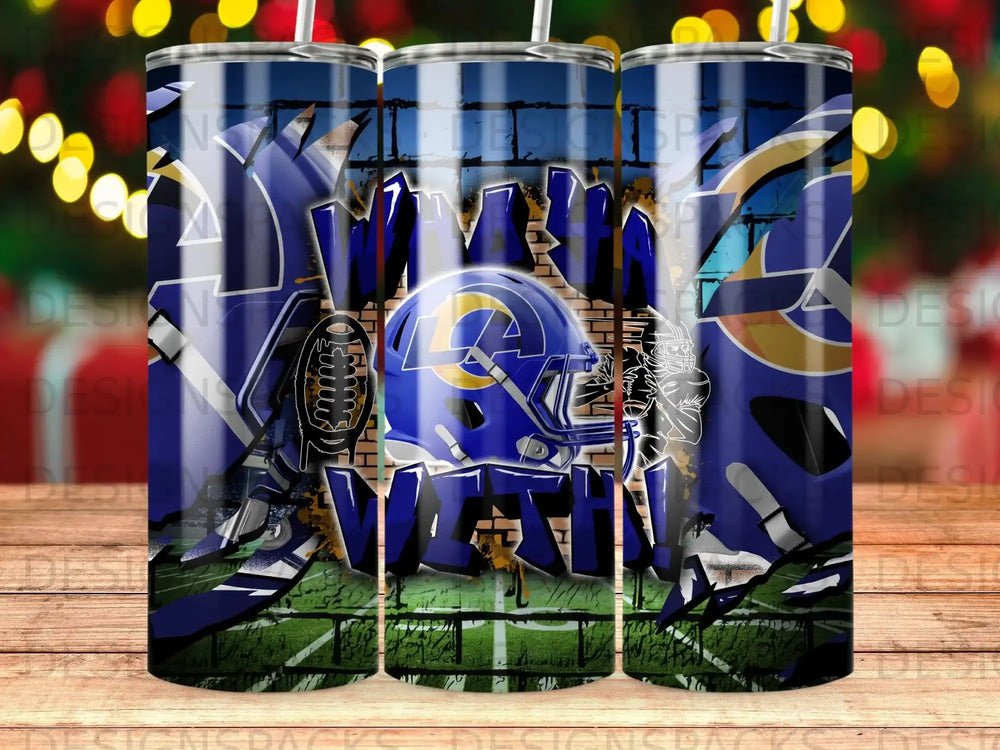 Los Angeles Rams helmet and football on grass field with "RAMBLING WRECK" text.