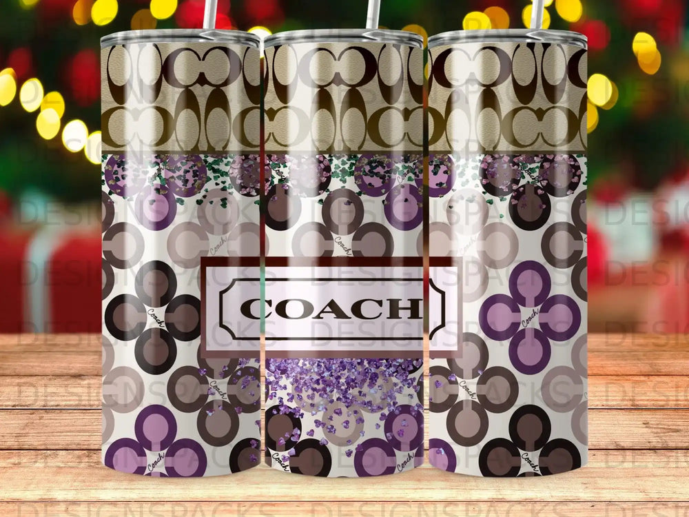 Coach pattern tumbler with glitter accents.