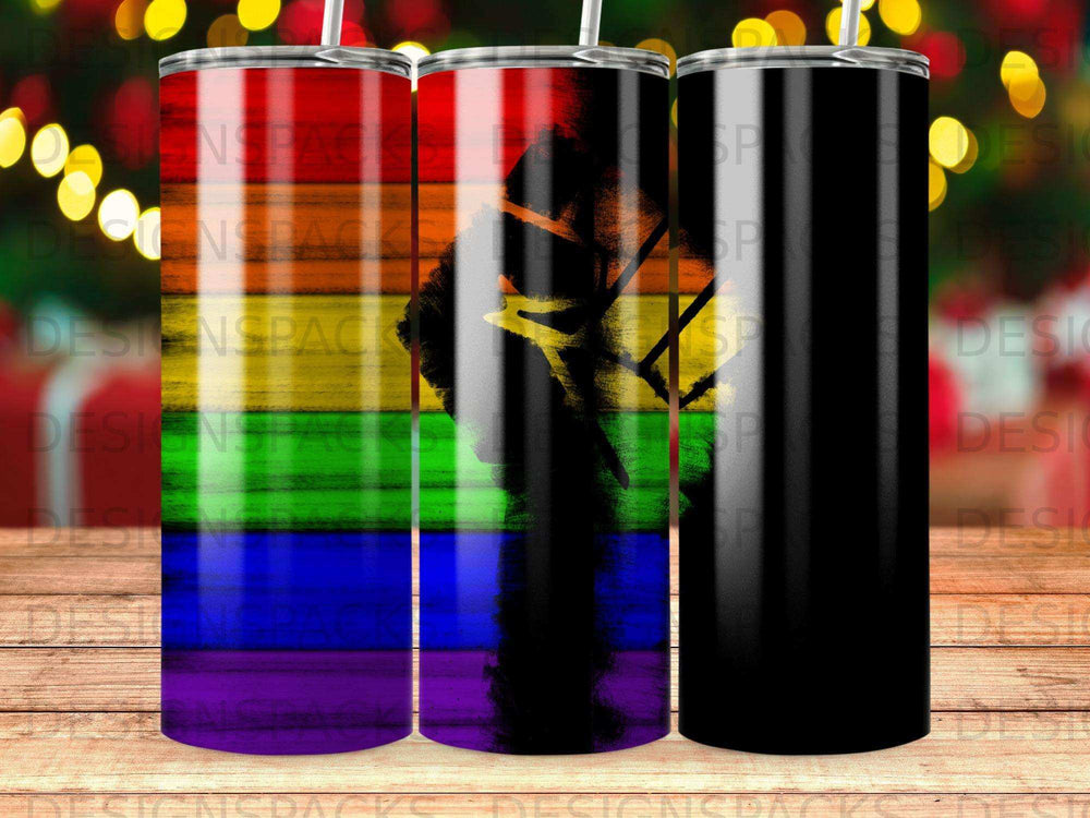 Tumbler with rainbow flag design and black fist silhouette.