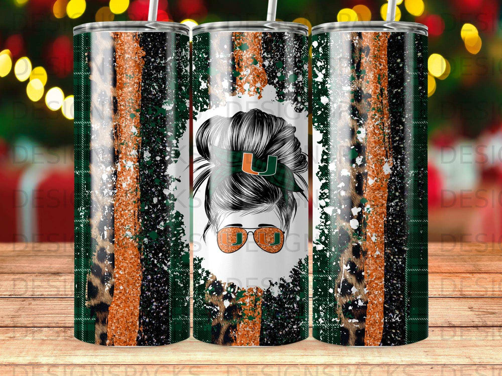 Tumbler with green, orange, and leopard print, featuring a woman's bun hairstyle and "U" logo.
