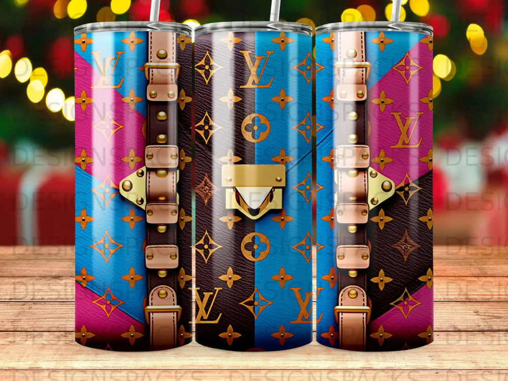 Tumbler with Louis Vuitton monogram pattern and leather strap accents.