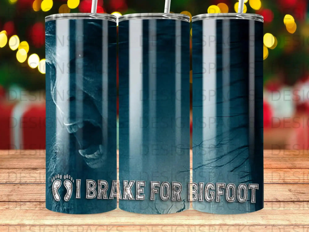 Tumbler with "I BRAKE FOR BIGFOOT" text and a silhouette of Bigfoot.