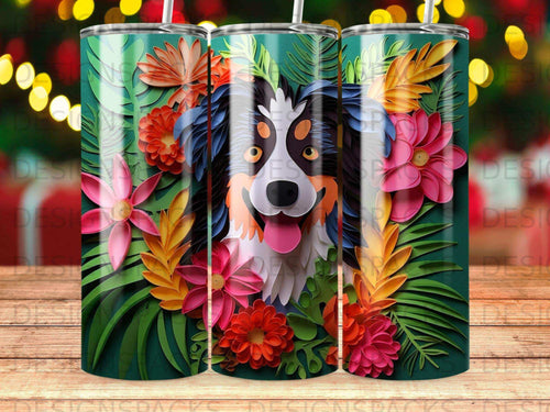Australian Shepherd dog surrounded by colorful paper flowers and leaves.