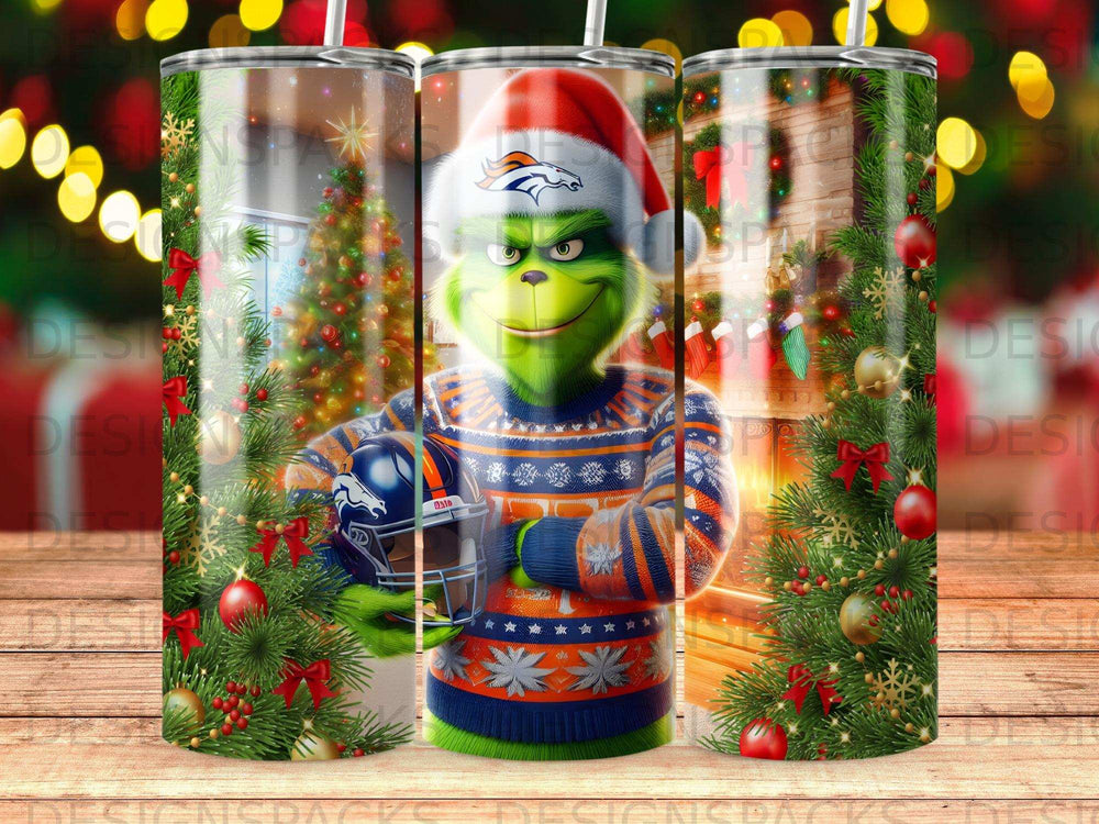 Grinch wearing Broncos hat and sweater holds helmet with Christmas tree background.