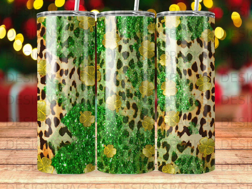 Leopard print and glitter shamrock tumbler with green glitter background.