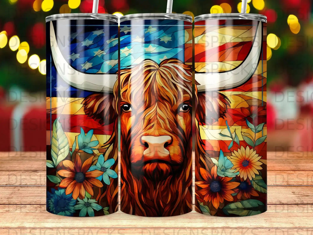 Highland cow portrait with American flag and floral accents on tumbler.