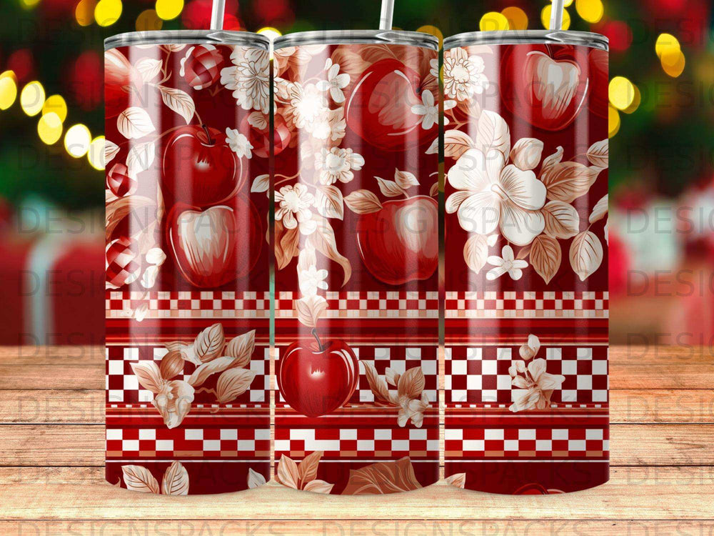 Red tumbler with apples, flowers, and plaid pattern.