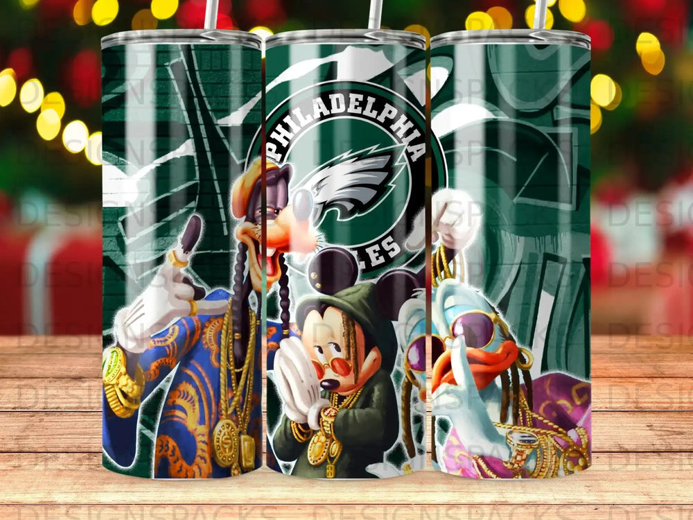 Mickey, Donald, and Goofy in Eagles jerseys with city skyline and cityscape.