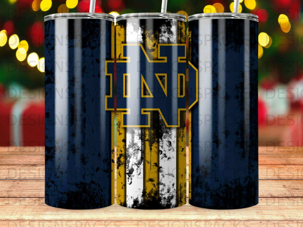 Notre Dame Fighting Irish logo on a navy and gold striped tumbler.