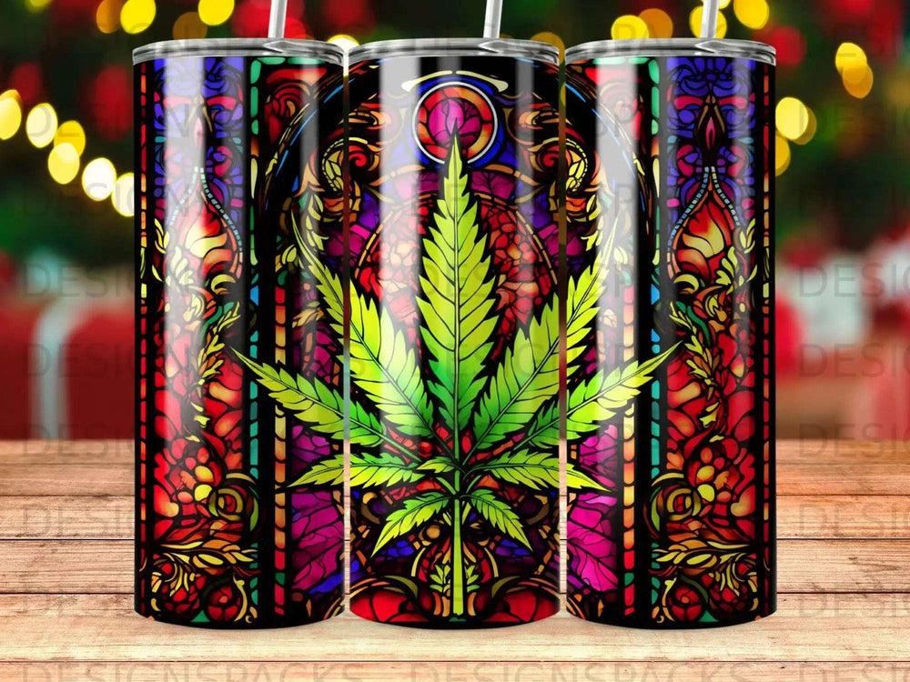 Stained glass cannabis leaf tumbler with colorful intricate patterns.
