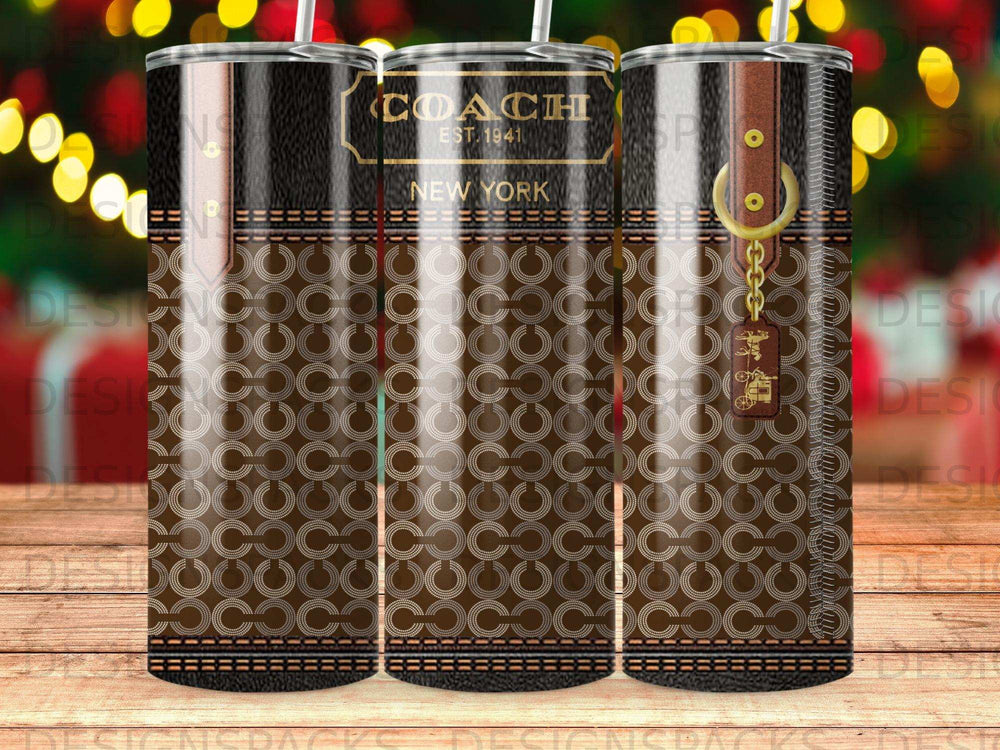 Coach New York insulated tumbler with repeating C logo pattern.