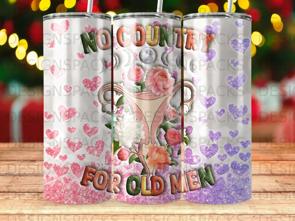 Tumbler with uterus graphic, moon phases, flowers, and text "NO COUNTRY FOR OLD MEN".