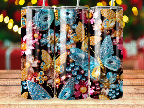 Tumbler with iridescent butterflies and jeweled floral accents on a black background.