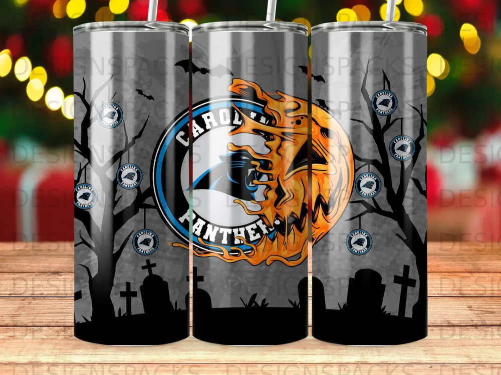 Carolina Panthers logo on a Halloween-themed tumbler with spooky trees and gravestones.
