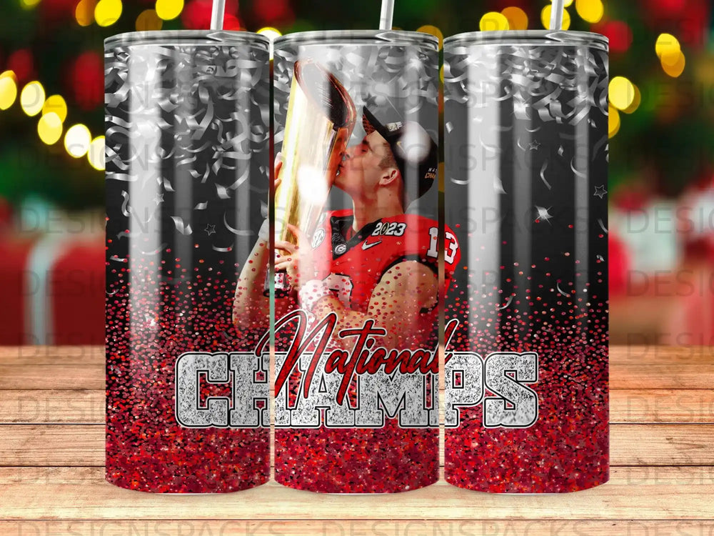 Georgia Bulldogs quarterback Stetson Bennett kisses championship trophy with "National Champs" text.