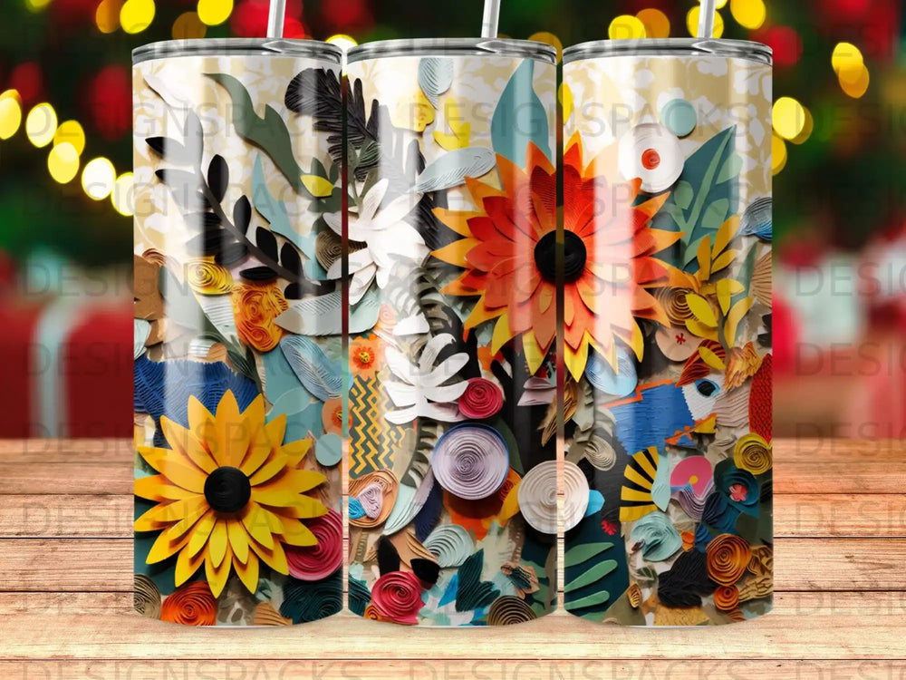 Floral and paper cutouts adorn a triple tumbler design.