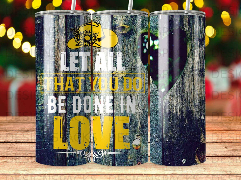 Tumbler with "Let all that you do be done in love" text and sunflower hat.