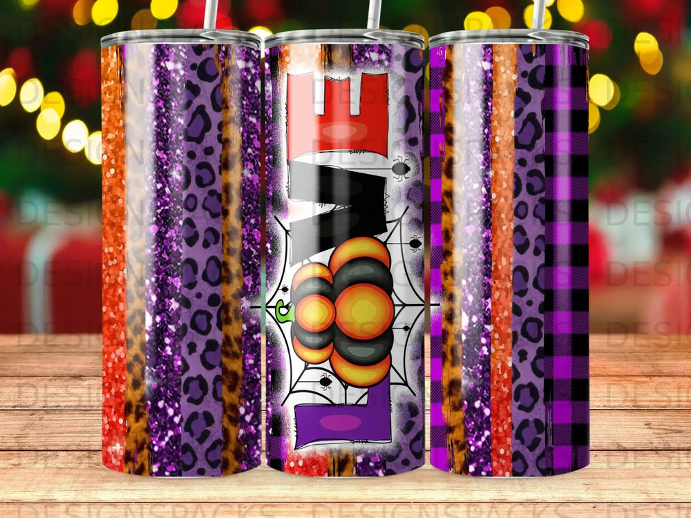 Halloween tumbler with spooky designs and leopard and plaid patterns.