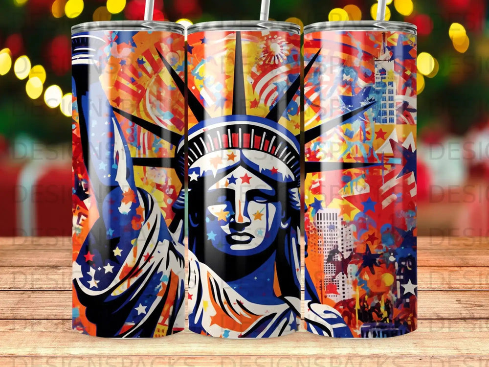 Statue of Liberty design on three tumblers with colorful fireworks and city skyline.