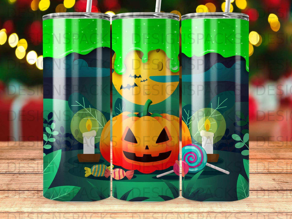 Halloween tumbler with pumpkin, candles, and candy on a dark, leafy background.