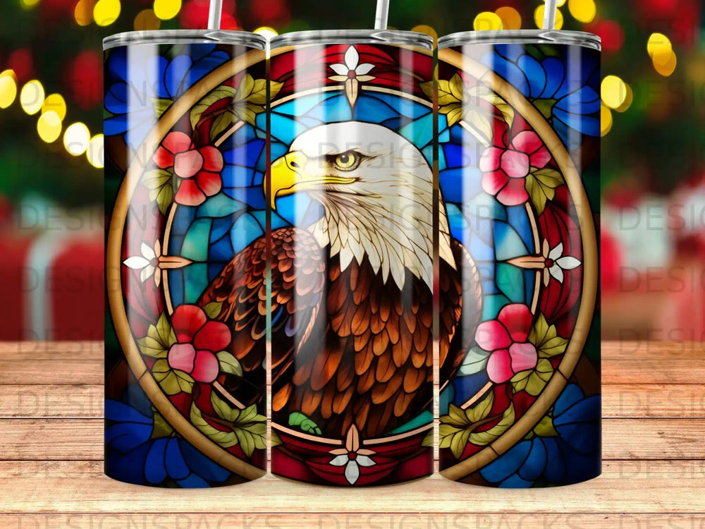Stained glass eagle with floral border on a tumbler.