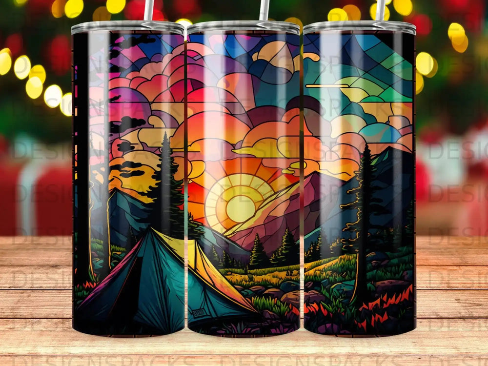 Colorful stained glass sunset over mountains and a tent.