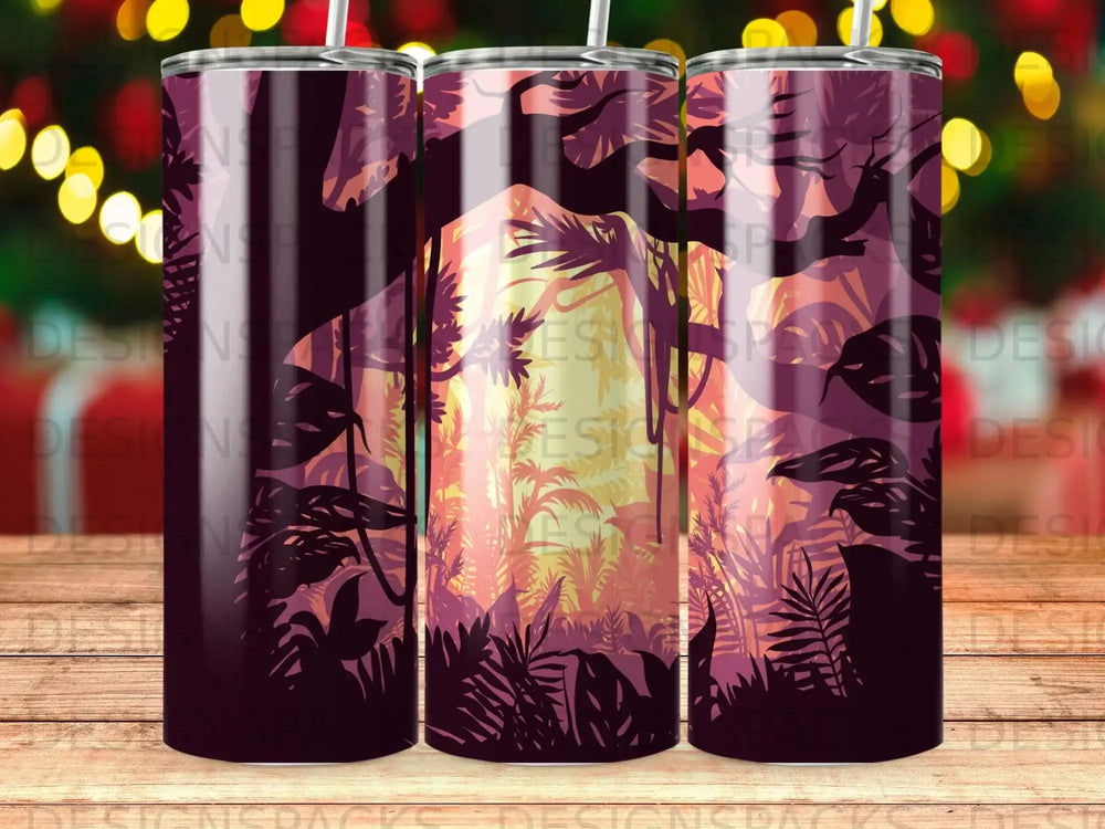 Jungle sunset with silhouettes of trees and foliage.