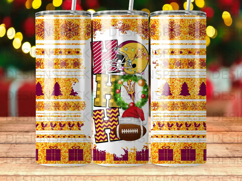 Holiday tumbler with "HO HO HO" text, football, and snowflake patterns.