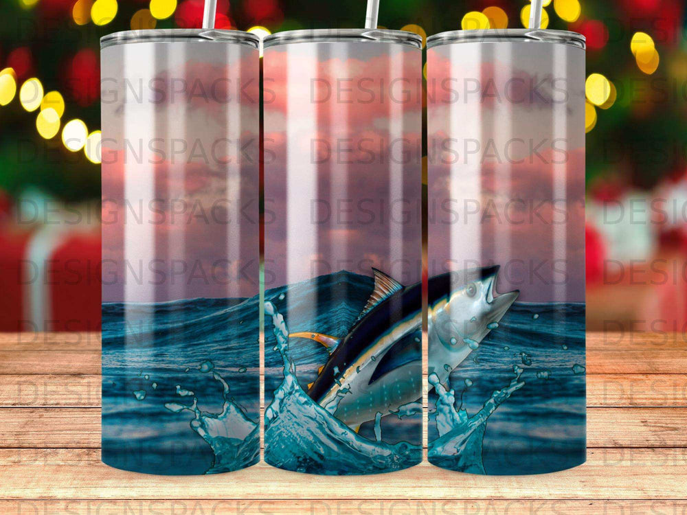 Tuna jumping from water with sunset background and repeating "DESIGNSPACKS" watermark.