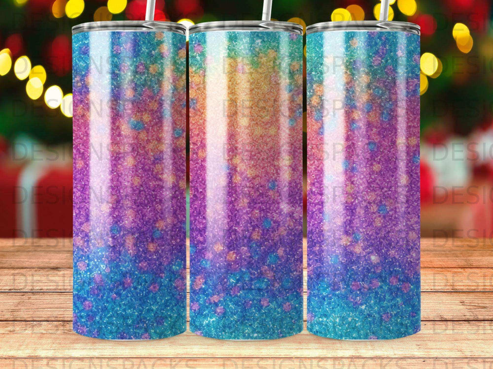 Glittery tumbler with blue, purple, and orange ombre design.