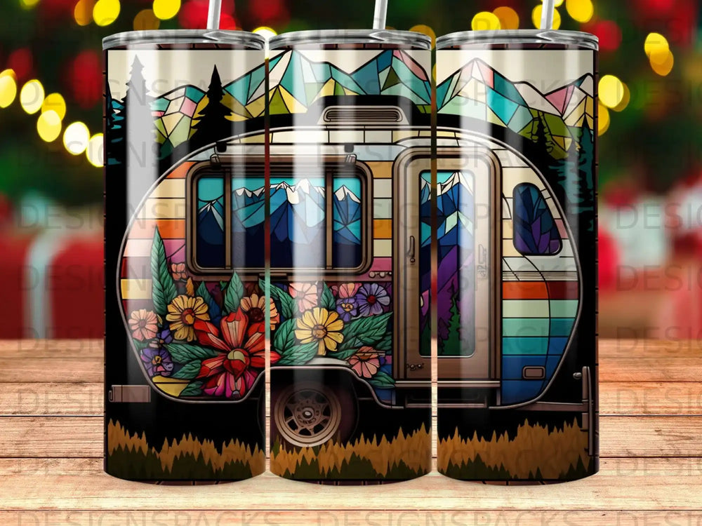 Camper trailer with stained glass floral and mountain scene.