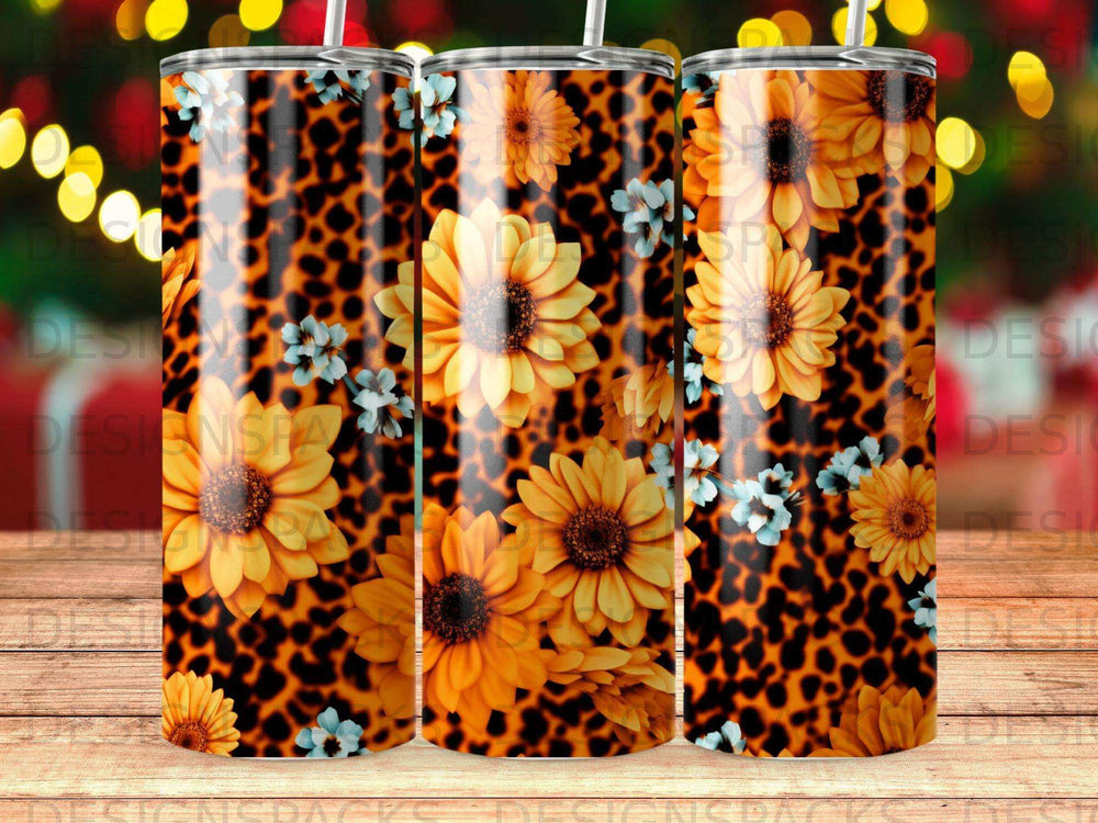Leopard print tumbler with sunflowers and small blue flowers.