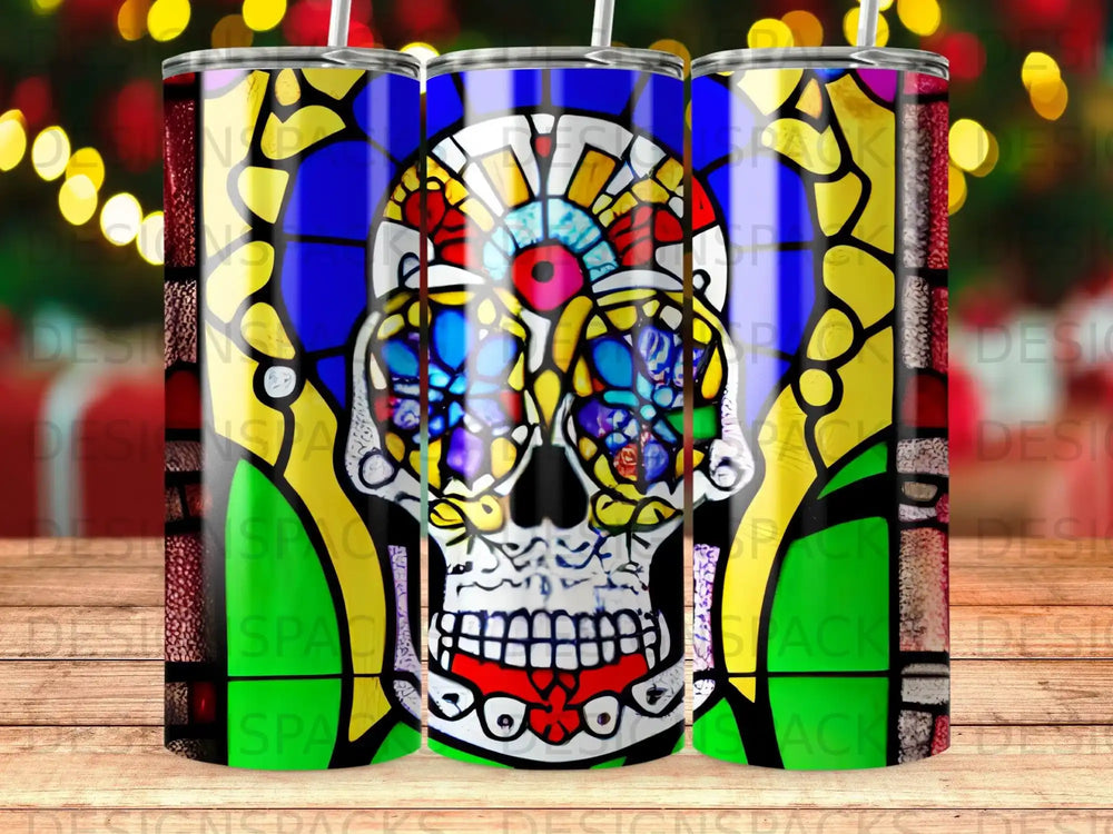 Sugar skull tumbler with stained glass pattern and festive bokeh lights.