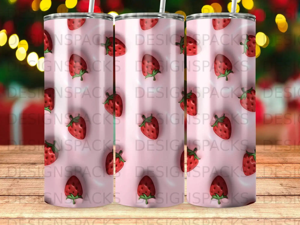 Pink tumbler with repeating strawberry pattern and "DESIGNSPACKS" watermark.