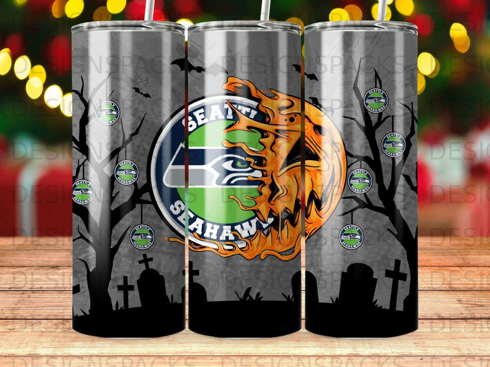 Seattle Seahawks Halloween tumbler with spooky trees and tombstones.