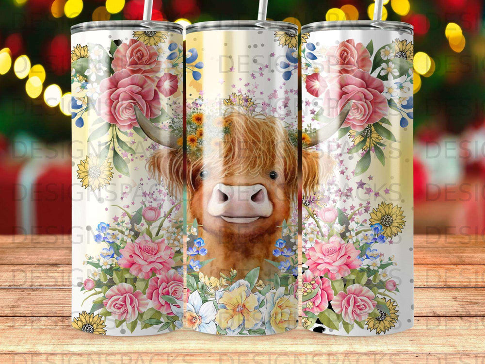 Highland cow with flowers and bokeh lights on a tumbler.