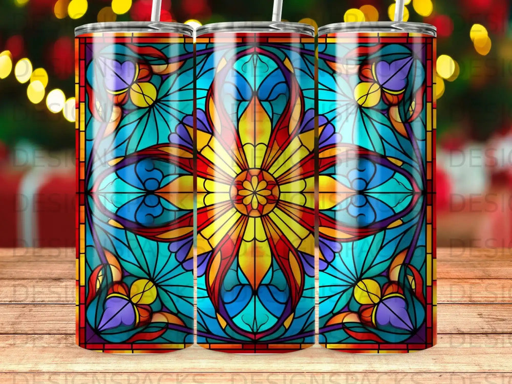 Stained glass tumbler with floral sunburst design.