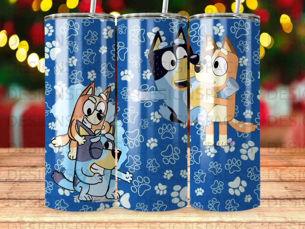 Bluey and Bingo characters on a blue tumbler with paw print pattern.