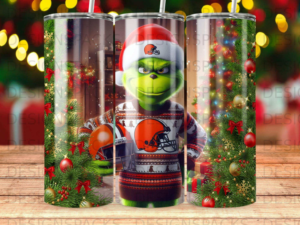 Grinch character holding Cleveland Browns helmet with holiday decorations.
